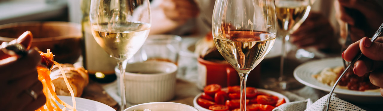 set table with wine and food